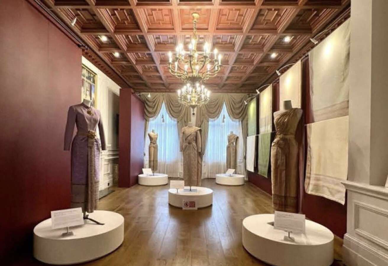 Thai traditional dress exhibition with mannequins on circular display plinths